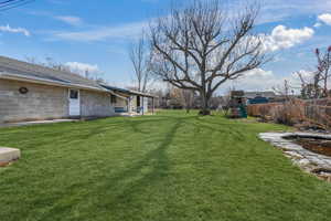 View of yard with a pond.