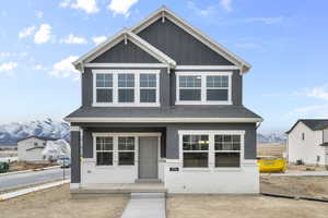 View of front of house with a mountain view