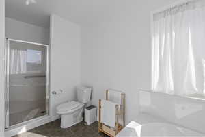 Bathroom with walk in shower and toilet