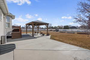 View of patio featuring a gazebo