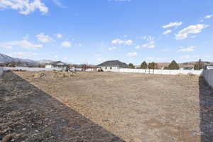 View of yard with a mountain view