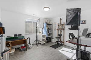 Home office featuring a textured ceiling