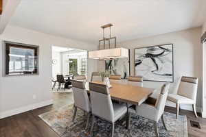 Dining space featuring dark hardwood / wood-style floors