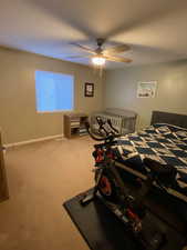 Bedroom featuring carpet flooring and ceiling fan