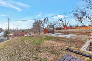 View of yard featuring a shed