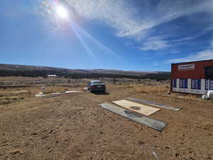 View of yard with a mountain view