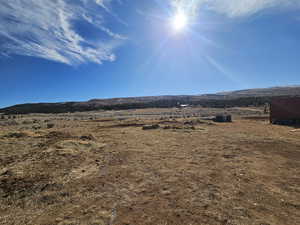 Property view of mountains featuring a rural view