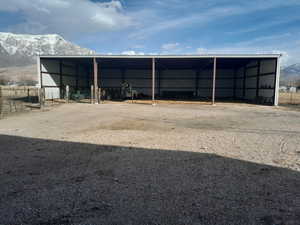 View of outbuilding with a mountain view