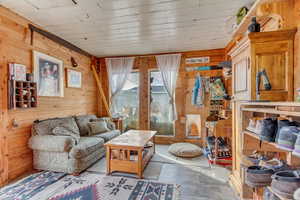 Mudroom with wood walls