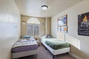 Bedroom with carpet flooring