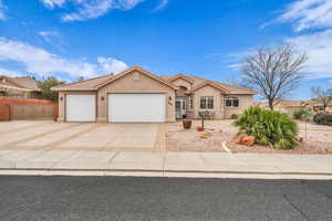 Single story home featuring a garage