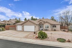 Ranch-style home with a garage