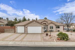 Ranch-style home featuring a garage