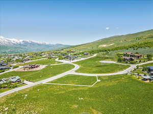 Birds eye view of property featuring a mountain view