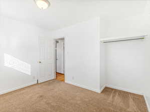 Unfurnished bedroom with new carpet