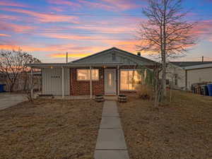 View of front of house featuring a yard