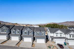 View of front of house with a mountain view