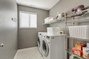 Laundry area with independent washer and dryer