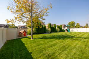 View of yard featuring a playground