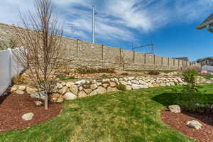 View of yard with a fenced backyard