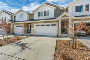 View of front of property featuring a garage