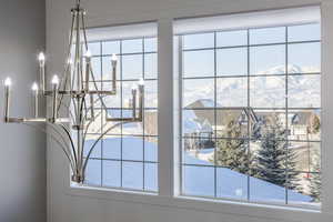 Interior details featuring an inviting chandelier and a mountain view