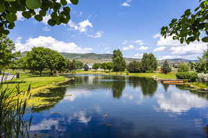 Property view of water with a mountain view