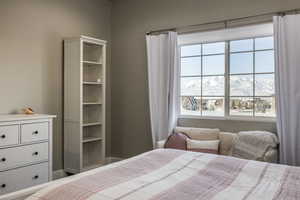 Bedroom featuring a mountain view