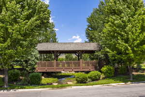 View of property's community featuring a wooden deck