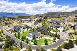 Birds eye view of property featuring a mountain view