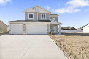 Craftsman house with a garage