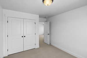 Unfurnished bedroom with a closet