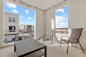 Large covered cement deck adds to living space without taxable square footage.