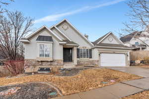 View of front of home featuring a garage