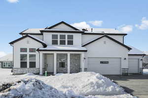 View of front property featuring a garage