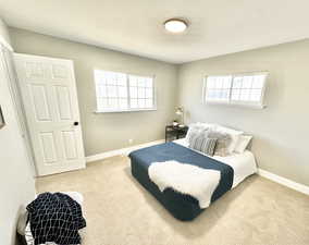 Bedroom featuring carpet flooring