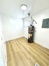 Utilities with electric panel and secured water heater