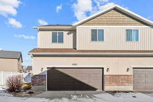 View of front of home featuring a garage