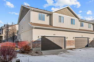 View of front of home with a garage