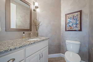 Bathroom with vanity and toilet