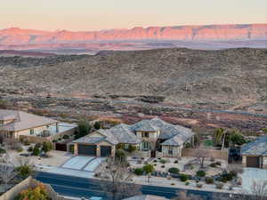 Aerial view at dusk featuring a mountain view