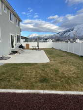 View of yard featuring a mountain view and a patio area