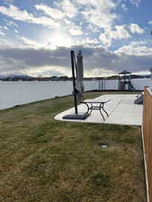 View of yard with a playground and a patio area