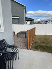 View of patio with a mountain view