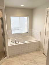 Bathroom with separate shower and tub