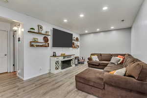 Living room featuring light hardwood / wood-style flooring