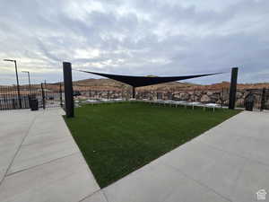 View of property's community featuring a yard and a mountain view