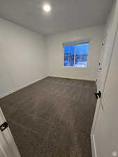 View of carpeted spare room