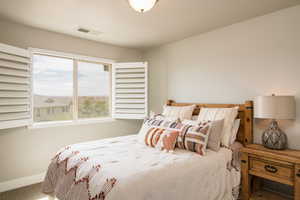 Bedroom featuring carpet floors