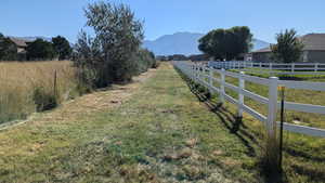 View of yard featuring a mountain view and a rural view